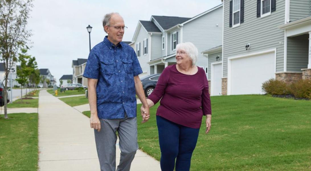 Couple walking in their neighborhood