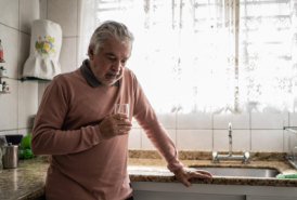 Man leaning on counter