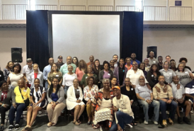 Large group of people posing for a picture.