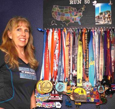Peggy Faber with her race medals