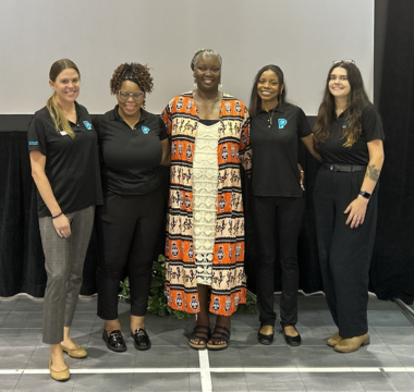 Five Women posing for a picture