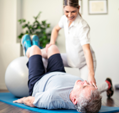 PT stretching a man