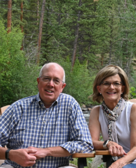 Rick and Susan Kastner sitting outside.