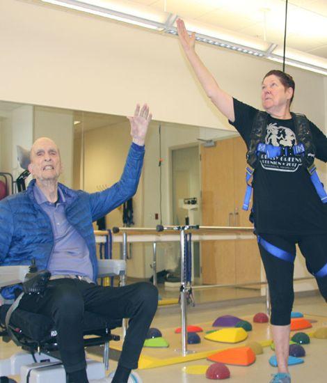 Man stretching at exercise class