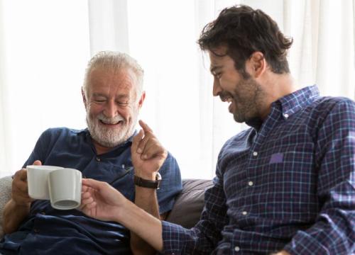 Father and son drinking coffee