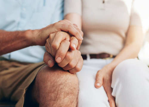 a couple holding hands