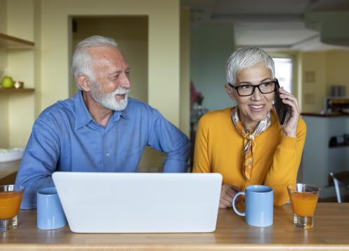 Couple using a laptop