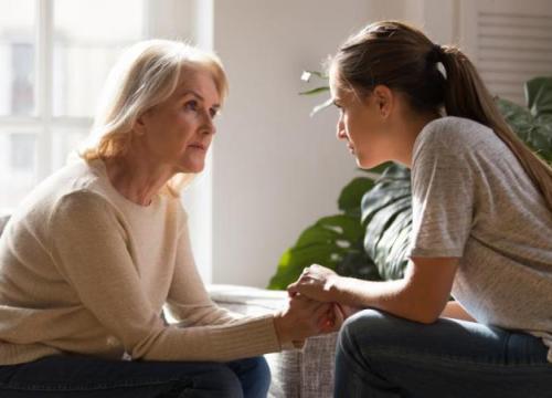 Woman talking to her daughter