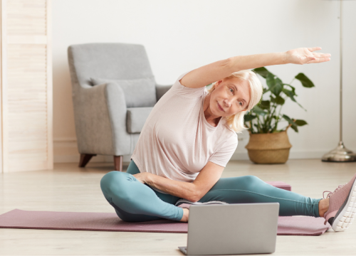 Woman stretching on a mat