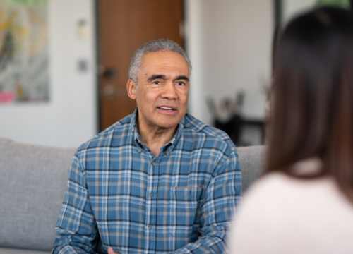 Man talking to therapist