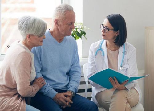 Doctor talking to patients