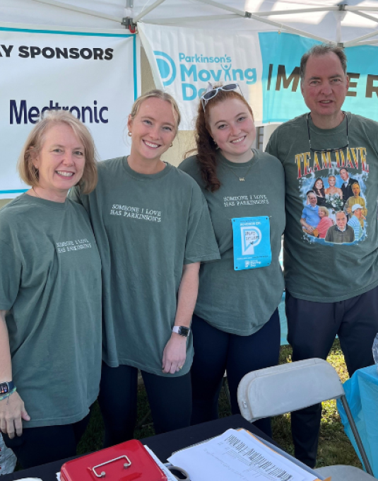 Ripley Hensley and her dad, mom, and sister, posing for a picture at Parkinson's Moving Day