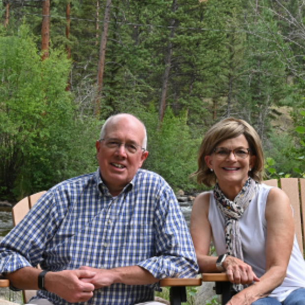 Rick and Susan Kastner sitting outside.