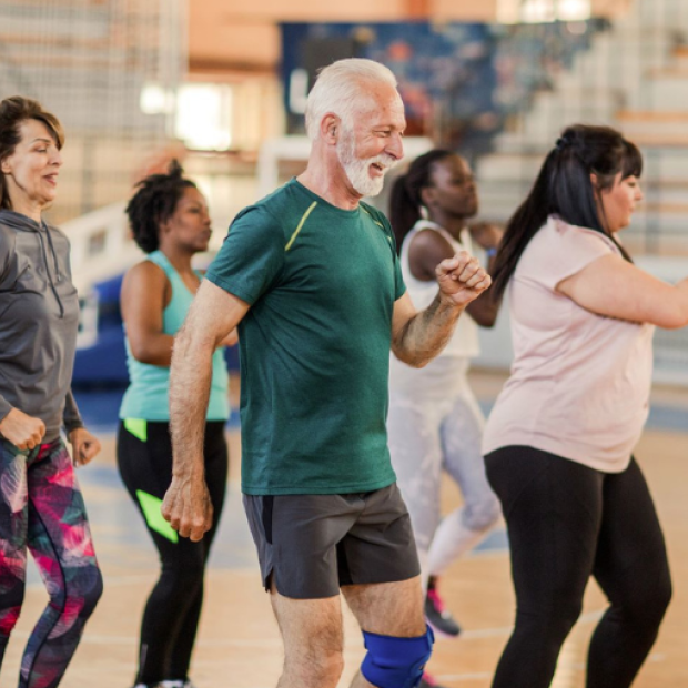 Group of people dancing at exercise class