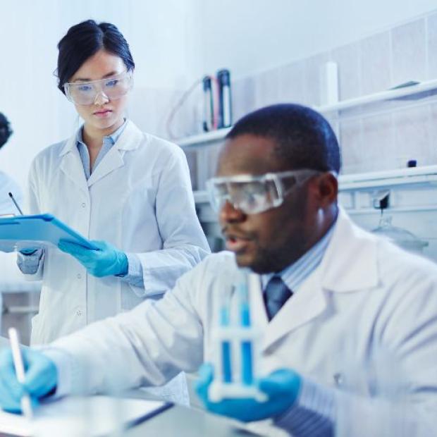 Three researchers in a lab