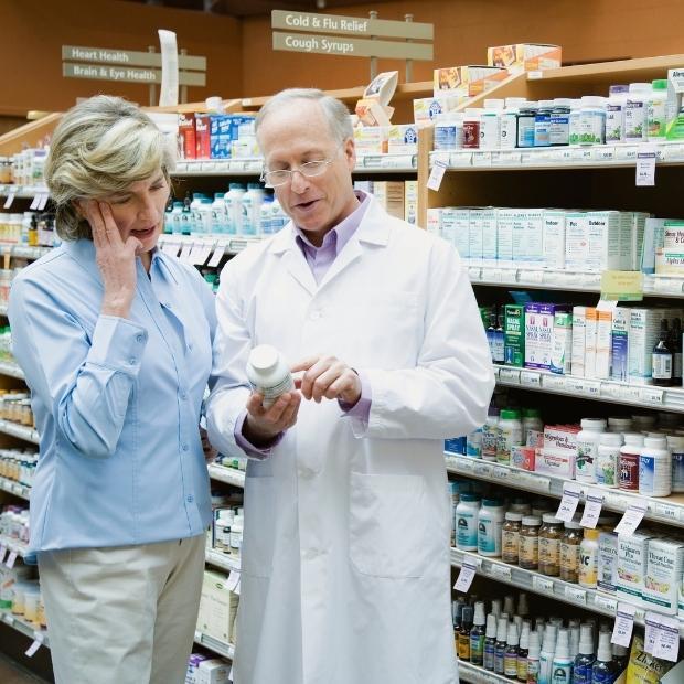 Pharmacist looking at medicine