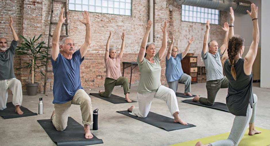 Exercise class of people stretching