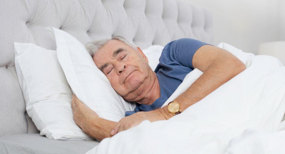 Man sleeping in bed