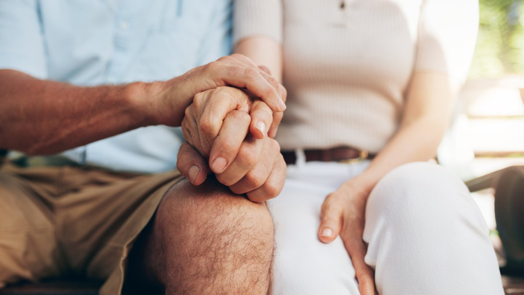 a couple holding hands