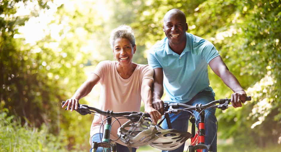 A couple biking together