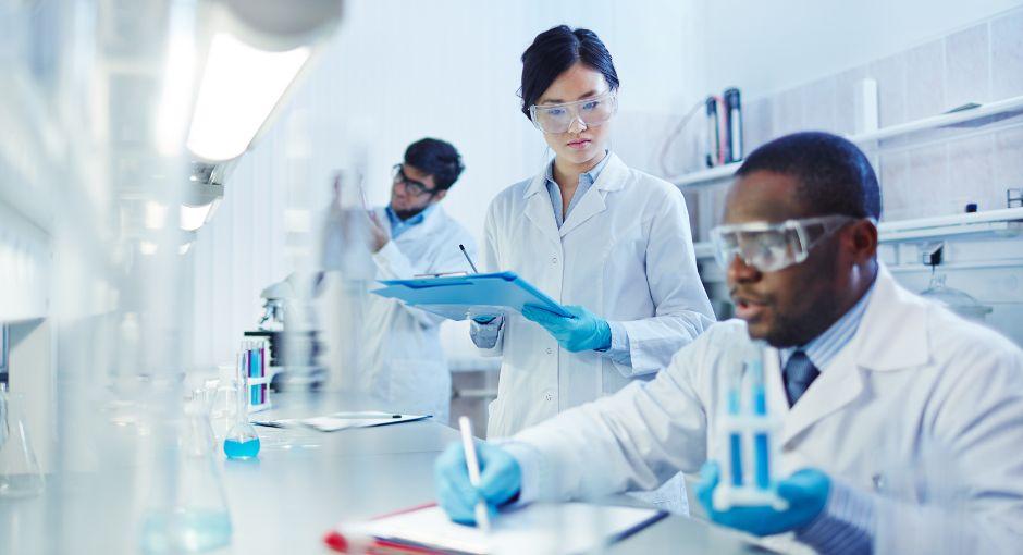 Three researchers in a lab
