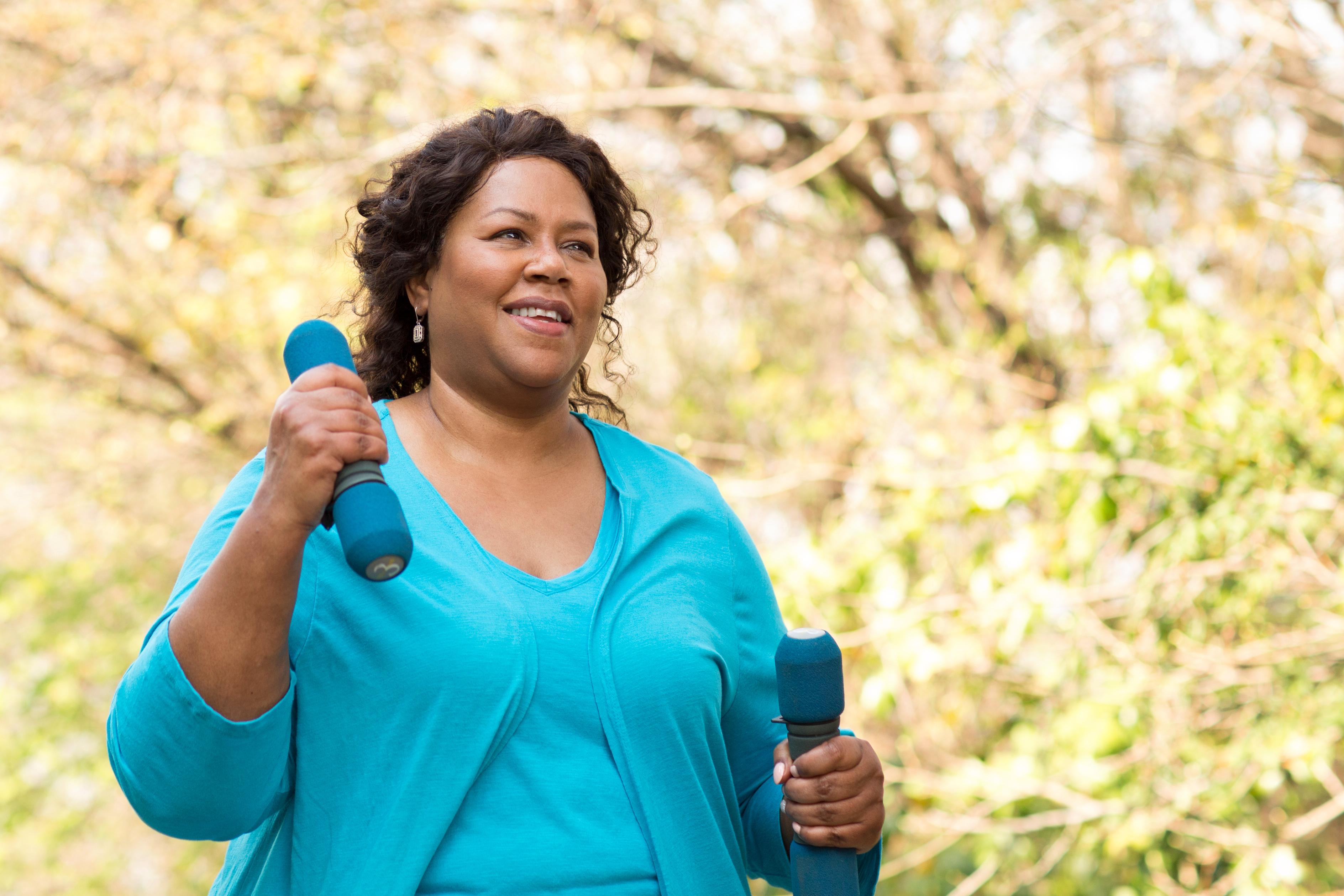 Woman exercising with weights