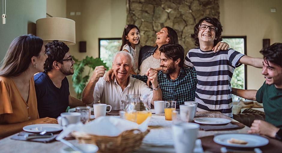 Hispanic family sitting around a table