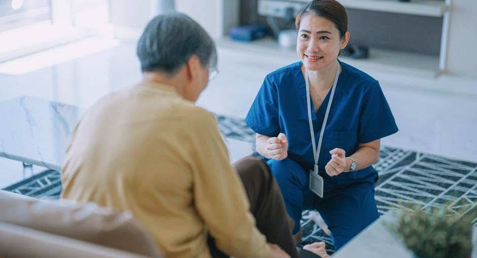 Occupational therapist working with patient