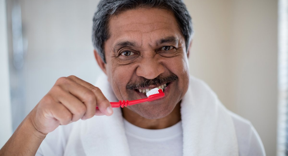 Man brushing his teeth