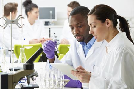 Scientists testing in a lab