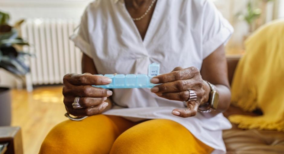 Women holding medication scheduler