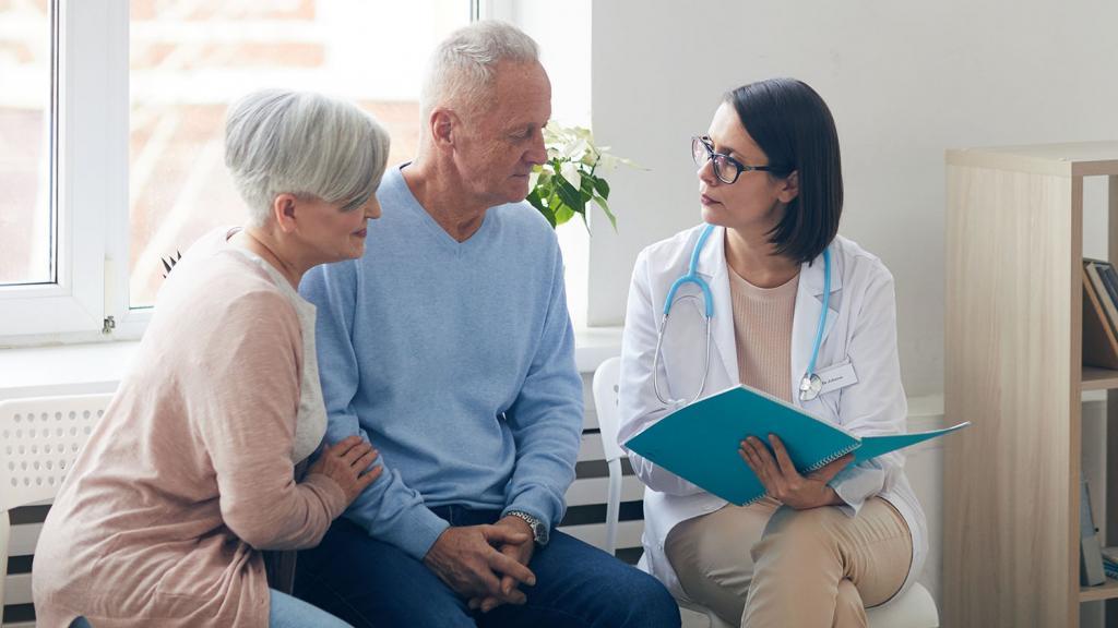 Doctor talking to patients